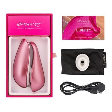 Вакуумний кліторальний стимулятор Womanizer Liberty Pink, магнітна кришка, 2 насадки &mdash; купити в інтим-бутику EroticToys